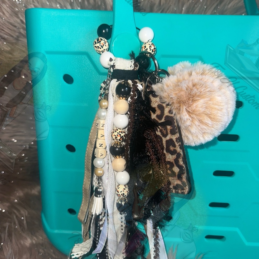 Stylish Teal Tote Bag with Leopard Print Tassel
